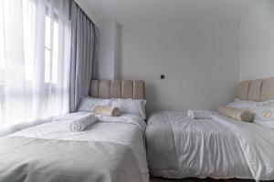 Beautifully and Elegantly furnished three bedroom with swimming pool fully equipped gym ample parking ,children playing ground and amazing scenic city views