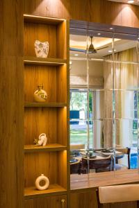 Varsha Greens 4-BHK Retreat with Pvt Pool, Lush Garden & Outdoor Patios