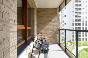 Modern Apartment with Parking & Gym by Noclegi Renters