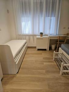 Dreibettzimmer mit Bergblick