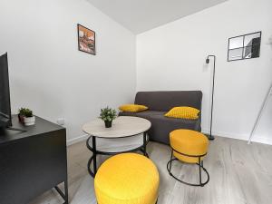 Appartements Studio la cour du botaniste : photos des chambres