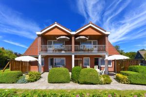 Ferienwohnungen im Haus Eilers - 4hvězdičkové hotely ve městě Neuharlingersiel