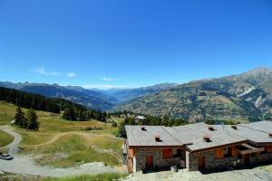 ARC 1600, LE RIDGE, Appartement 08 personnes Vue Montagne - ski aux pieds - Sauna, Hammam, Piscine