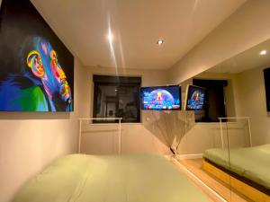 Villas Capsule la grange arcade de jeux billard 4 chambres 300m2 : photos des chambres