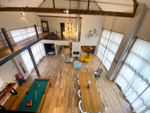 Villas Capsule la grange arcade de jeux billard 4 chambres 300m2 : photos des chambres