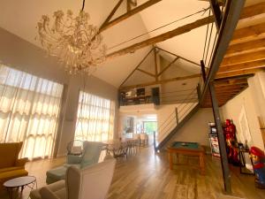 Villas Capsule la grange arcade de jeux billard 4 chambres 300m2 : photos des chambres