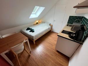 Appartements N6 - Petit studio proche du centre : photos des chambres
