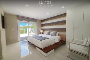 Luxurious Home with BBQ, Hot Tub, Heated Pool & Wifi - L36