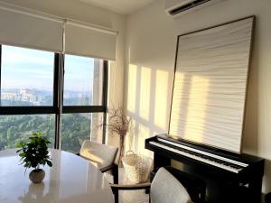 NEW Designer Condo - Panoramic Forest View - Steps To IOI City Mall - Your Best Urban Retreat