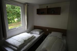 Appartements Le Domaine de Litteau 4 etoiles a LITTEAU emplacement 403 2CH 1SDB 6 personnes : photos des chambres