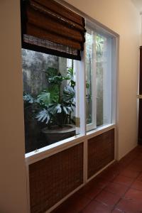 Geoffrey Bawas Home Number 11