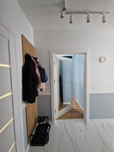 Niebieski apartament w Wileńska Park i prywatne miejsce w garażu podziemnym