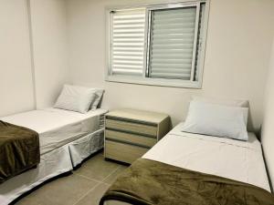 Próximo a Santa Casa - 02 quartos e garagem