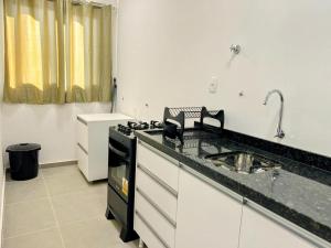 Próximo a Santa Casa - 02 quartos e garagem