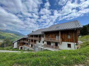 Appartements Appartement 4* pour 5 pers. a Valmorel, pied de pistes, parking, balcon - FR-1-356-477 : photos des chambres