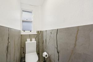 Spacious 4BR Home with Garden Close to Transport