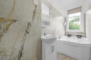 Spacious 4BR Home with Garden Close to Transport