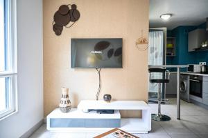 Appartements Le Golden - Centre Ville - Acces Transports en Commun - Balcon Cosy - Commerces a Proximite : photos des chambres