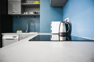 Appartements Le Golden - Centre Ville - Acces Transports en Commun - Balcon Cosy - Commerces a Proximite : photos des chambres