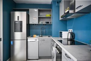 Appartements Le Golden - Centre Ville - Acces Transports en Commun - Balcon Cosy - Commerces a Proximite : photos des chambres