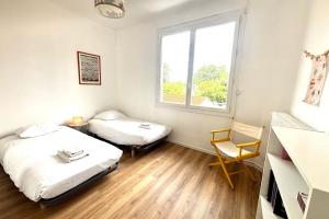 Appartements La Terrasse - Belle Terrasse - Wifi : photos des chambres