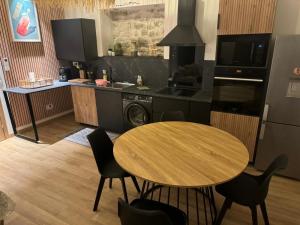 La Maison PP - Appartements : photos des chambres