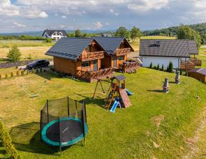 Domki w Blasku Słońca