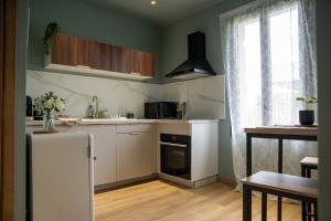 La Maison PP - Appartements : photos des chambres