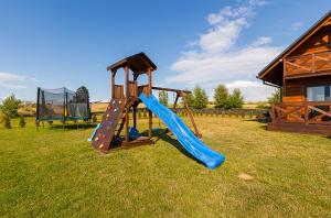 Domki w Blasku Słońca