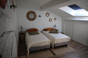 Maisons de vacances Logement en lisiere de foret : photos des chambres