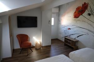 Maisons de vacances Logement en lisiere de foret : photos des chambres
