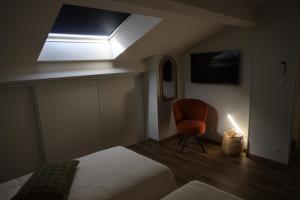 Maisons de vacances Logement en lisiere de foret : photos des chambres