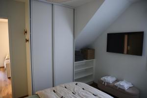 Maisons de vacances Logement en lisiere de foret : photos des chambres