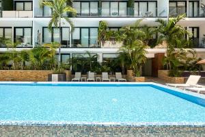 Rooftop Infinity Pool with Cinema & Gym near Beach