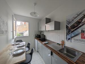 Appartements Joli appartement coeur de ville : photos des chambres