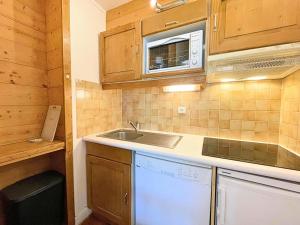 Résidence Oisans - Appartement chaleureux ski aux pieds aux Ménuires MAE-4874