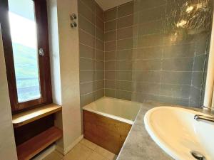 Résidence Oisans - Appartement chaleureux ski aux pieds aux Ménuires MAE-4874