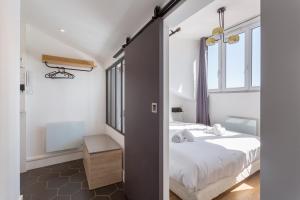 Appartements Belfort- Duplex : photos des chambres