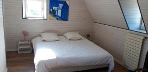 Villas Belle villa en bord de mer a 700 m d-une plage de sable fin : photos des chambres