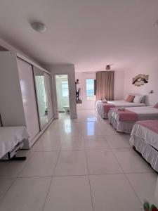 Aptos atrás da Passarela do Caranguejo