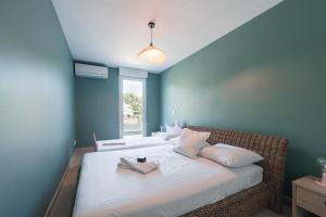 Appartements Le Bagnols - Appartement 2 ch parking et piscine : photos des chambres