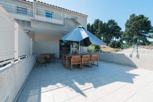 Appartements Le Bagnols - Appartement 2 ch parking et piscine : photos des chambres