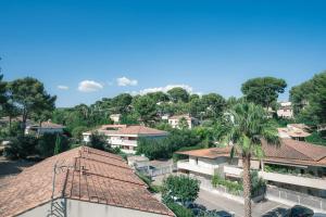 Appartements Le Bagnols - Appartement 2 ch parking et piscine : photos des chambres