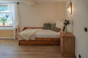 Alpino STAY Geräumige Ferienwohnung am Alpsee mit Garten