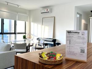 NEW Designer Condo - Panoramic Forest View - Steps To IOI City Mall - Your Best Urban Retreat