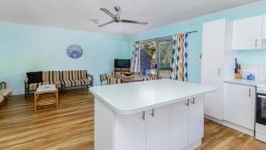 First floor unit close to shops, park and waterfront!