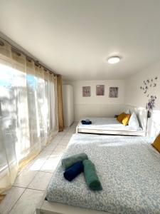 Appartements Charmants logements au centre ville de Rosny Sous Bois : photos des chambres
