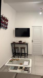 Maisons de vacances Studio jacuzzi a l-abri des vents : photos des chambres