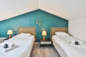 Maisons de vacances La tranquilite bleue - Maison avec Parking cloture : photos des chambres