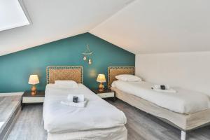 Maisons de vacances La tranquilite bleue - Maison avec Parking cloture : photos des chambres